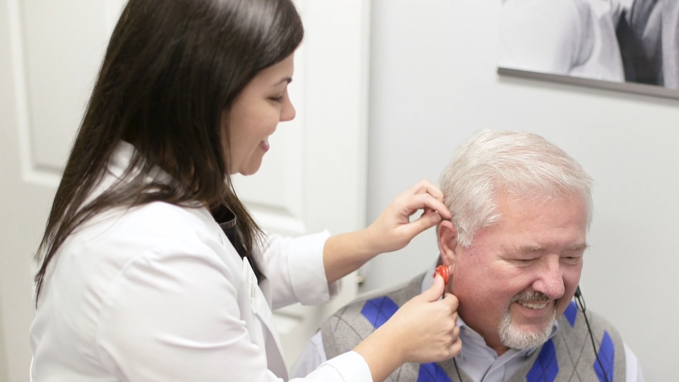 Dr. Tarvin performing Real Ear Measurements on a patient at Elevate Audiology